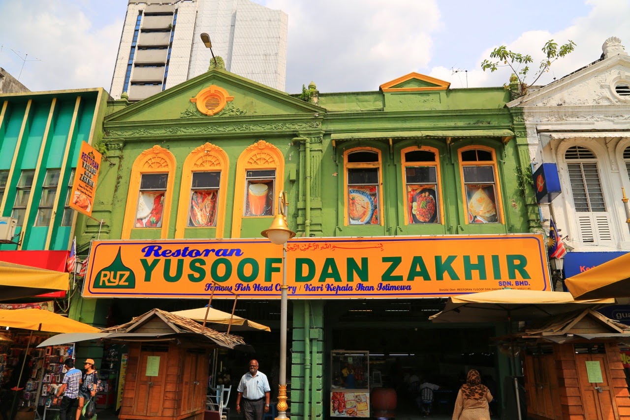 Façade verte d'une boutique de Chinatown