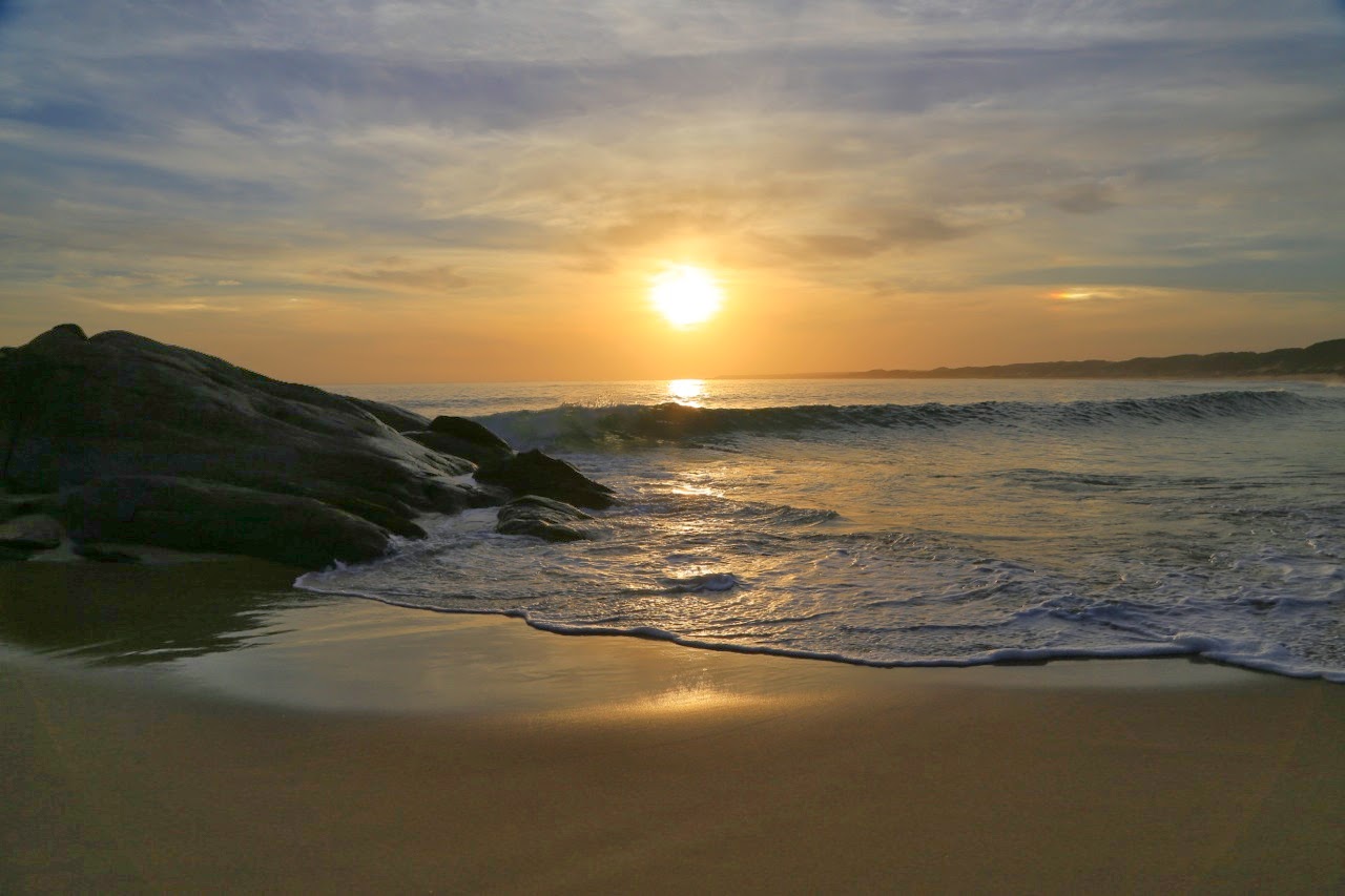 Soleil couchant sur la plage